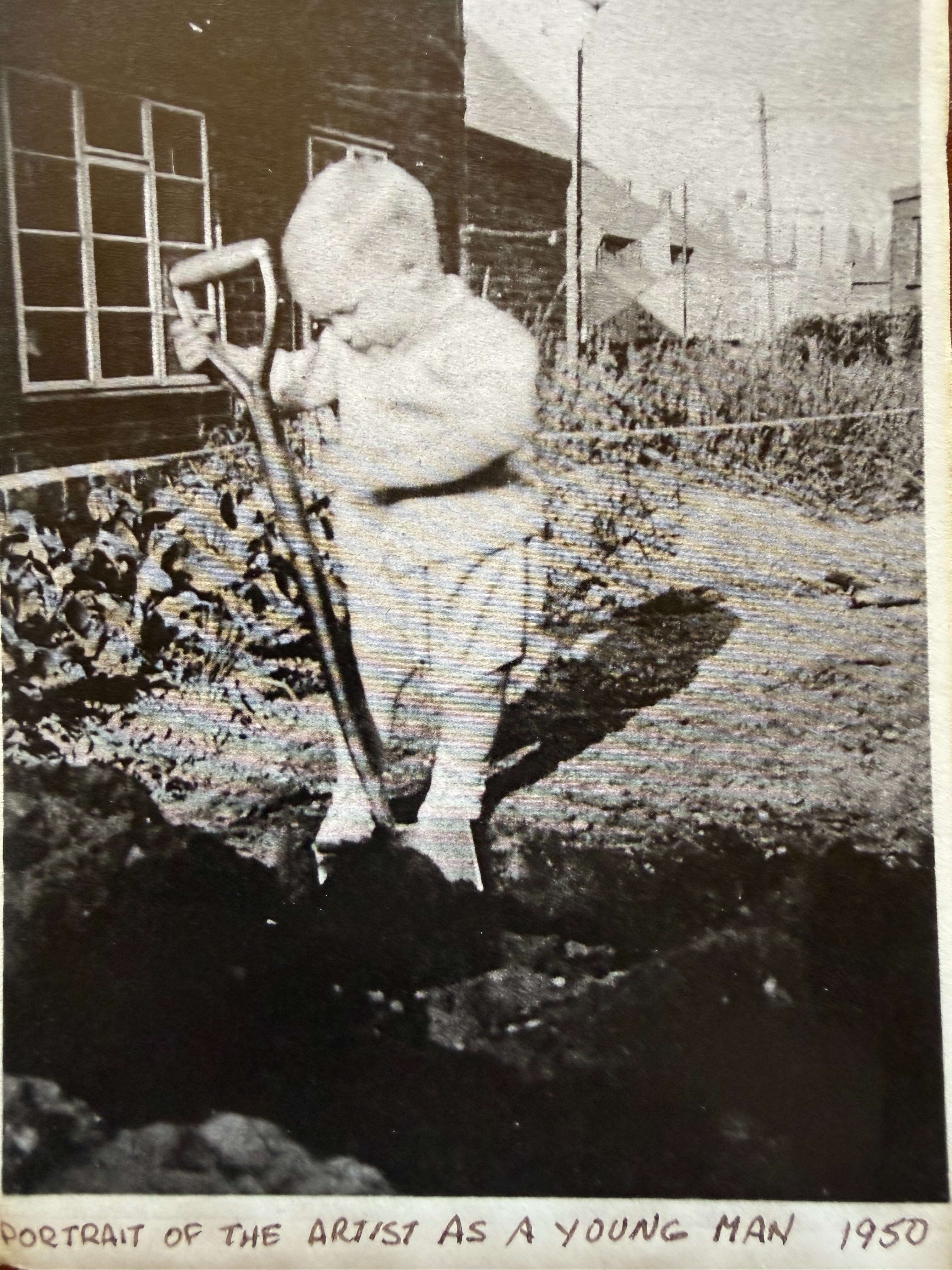 Neil Turnbull at age two with a spade shovel, 1950 — Portrait of the Artist as a Young Man